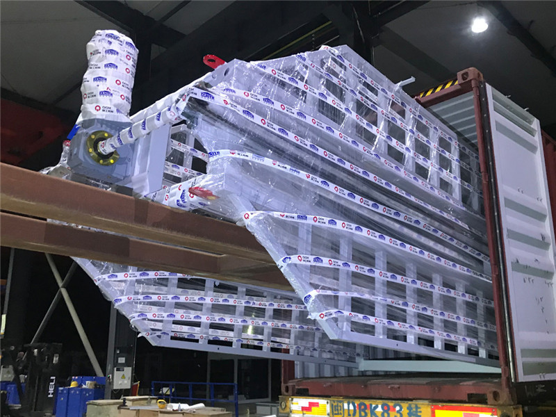 QGMs ZN900CG automatiske blokkmaskin med herdestativsystem ble sendt til El Salvador